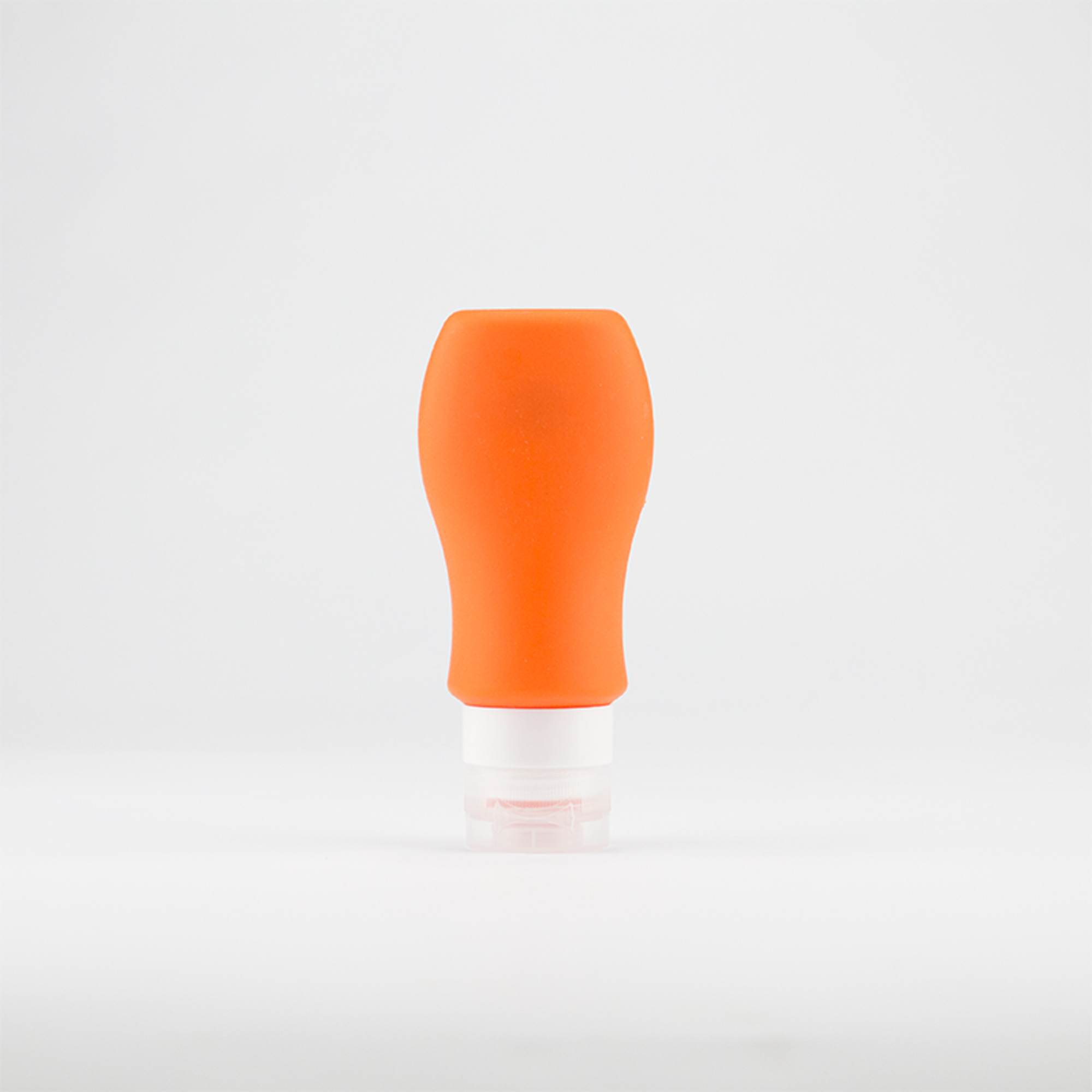 Silicone bottle with suction cup for liquids and gels